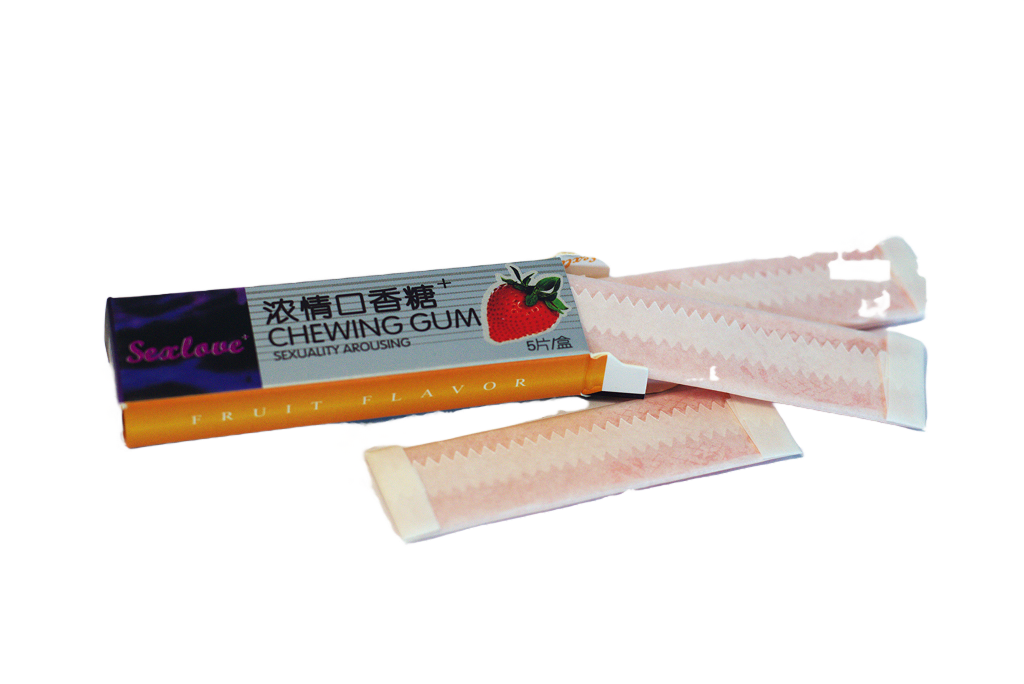 Kutija Sealove Chewing Gum Fruit Flavor pored ružičastih žvaka u omotu