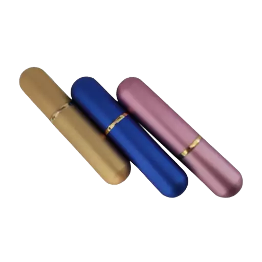 Tri metalna poppers inhalatora u zlatnoj, plavoj i roze boji